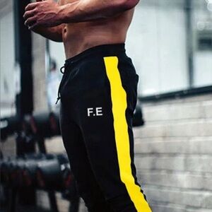 Black Joggers with Yellow Stripe size large Men